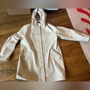 cream Uniqlo raincoat